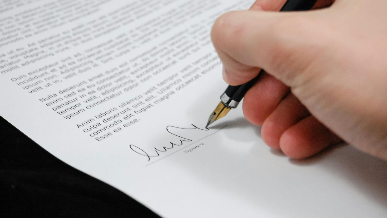 A person signing a document