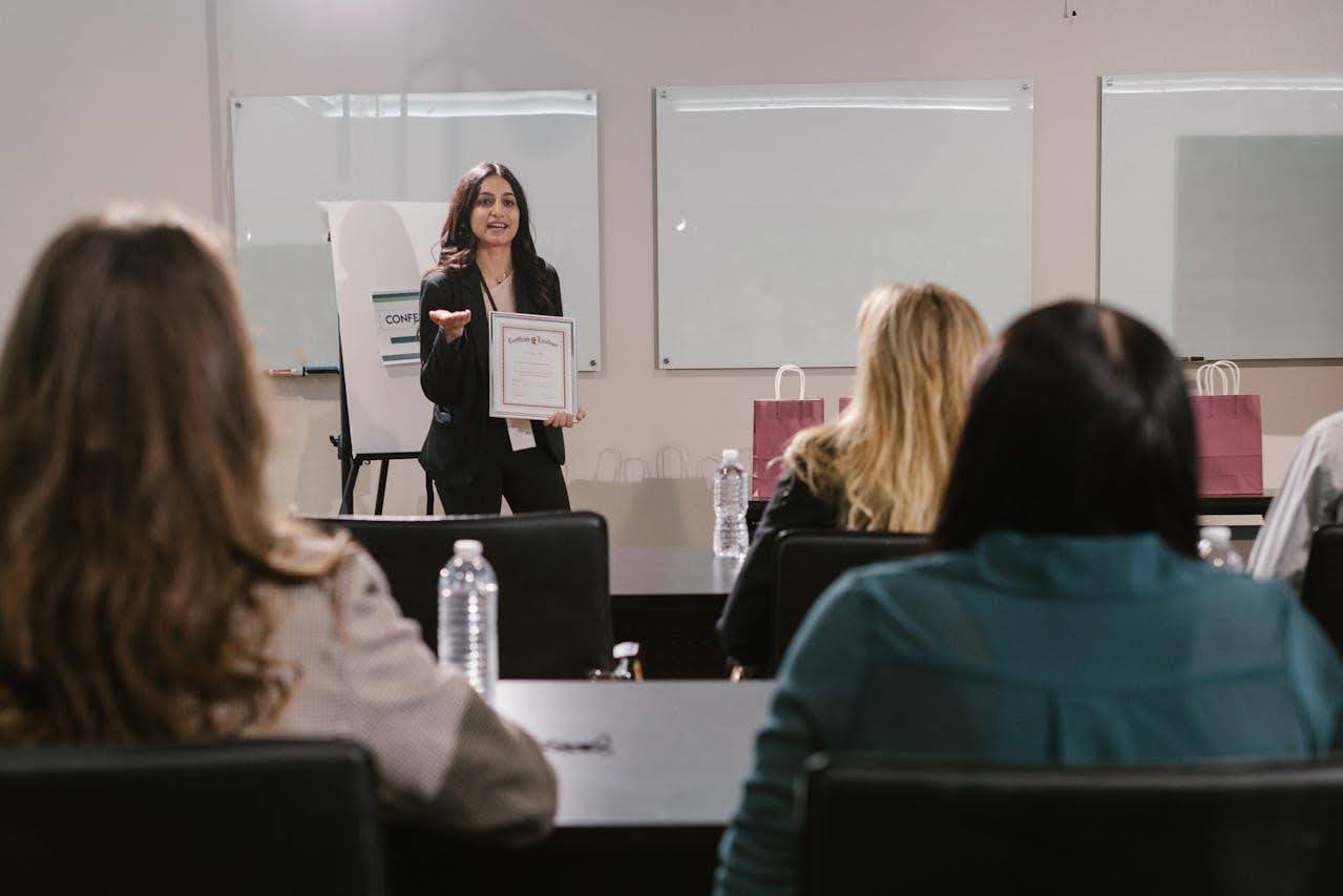 woman presenting at a conference